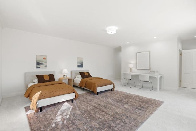 carpeted bedroom featuring crown molding