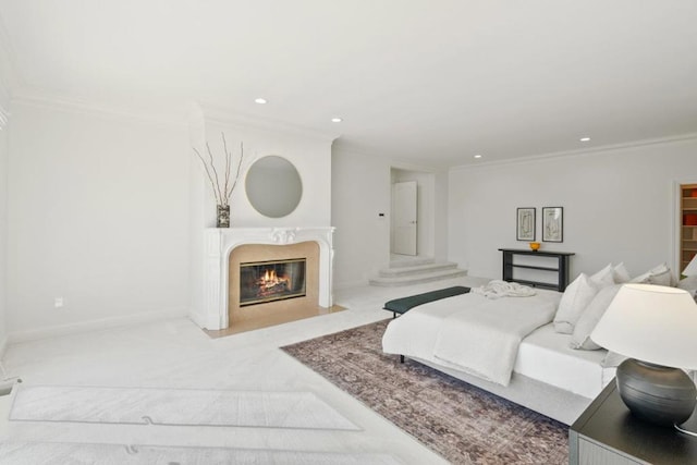 bedroom with light carpet, crown molding, and a high end fireplace