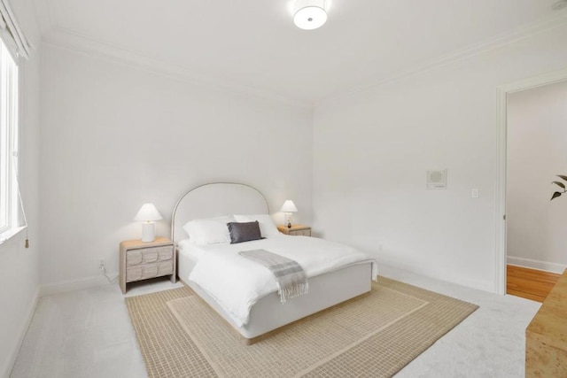 bedroom featuring ornamental molding