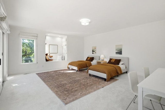 carpeted bedroom featuring ornamental molding