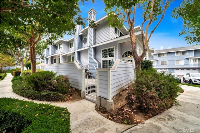 view of property exterior featuring a garage