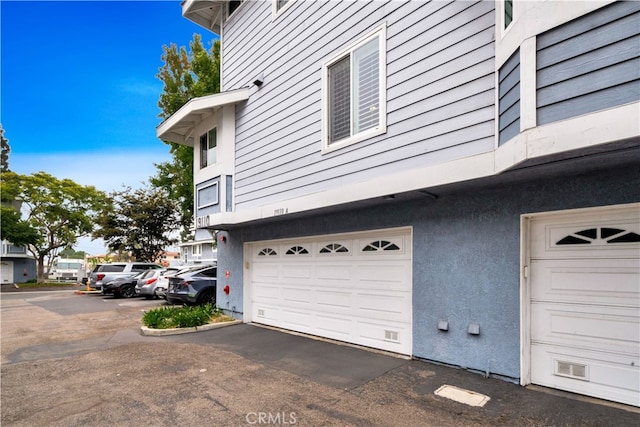 view of home's exterior featuring a garage