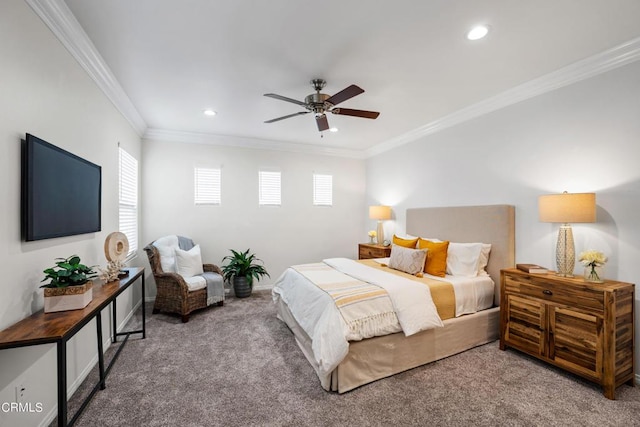 carpeted bedroom with ceiling fan and crown molding