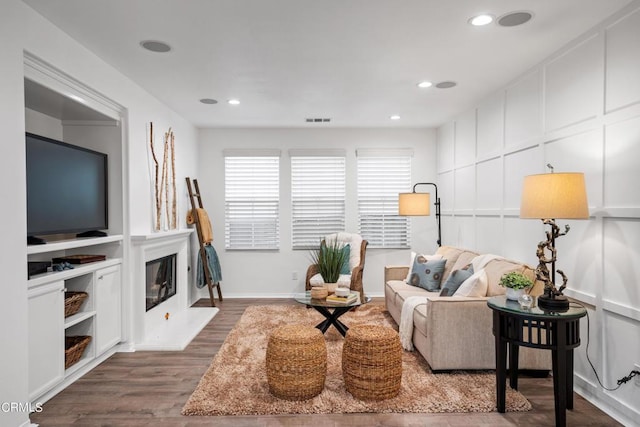 living room with dark wood-type flooring