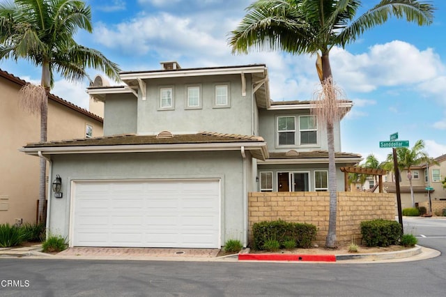 view of front of property featuring a garage