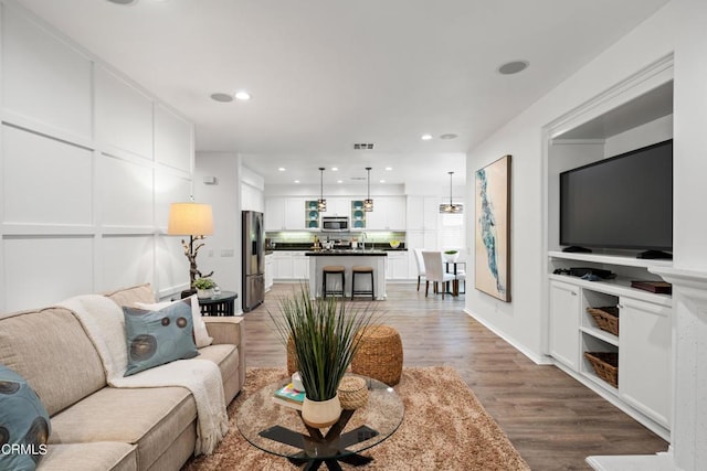 living room featuring wood-type flooring