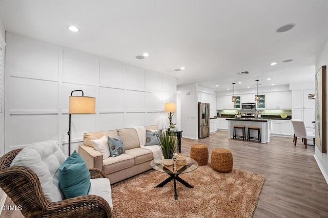 living room featuring hardwood / wood-style flooring