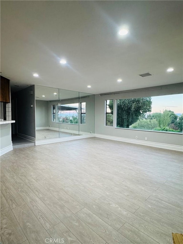 interior space with light hardwood / wood-style flooring