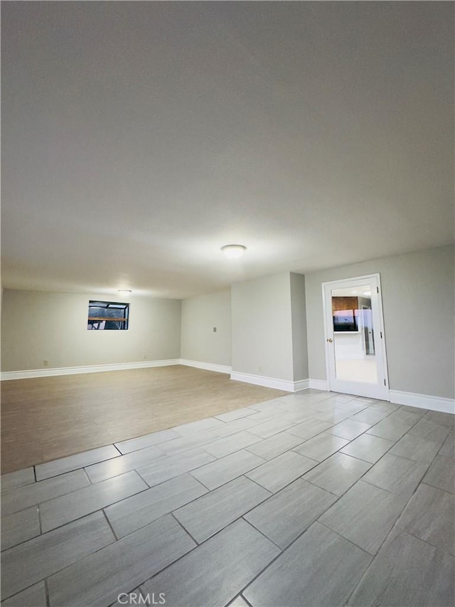 spare room featuring light wood-type flooring