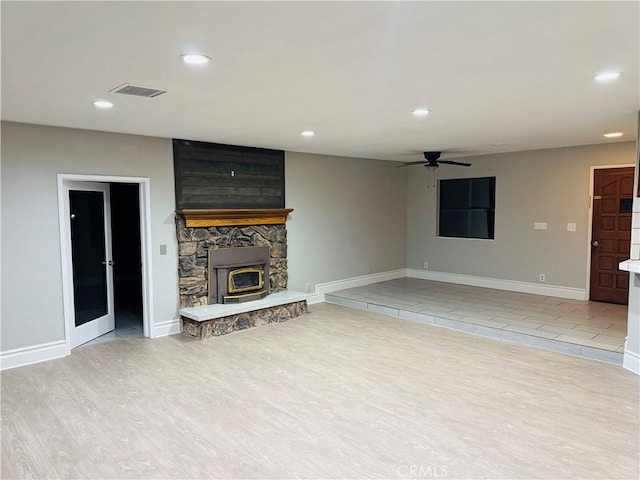 unfurnished living room with light hardwood / wood-style floors and ceiling fan