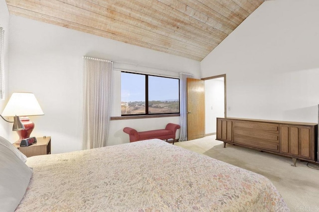 bedroom with high vaulted ceiling, light colored carpet, and wood ceiling