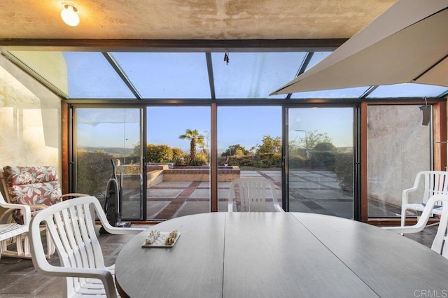 sunroom featuring a wealth of natural light