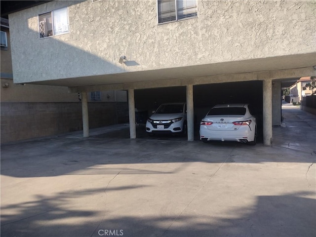 view of parking featuring a carport