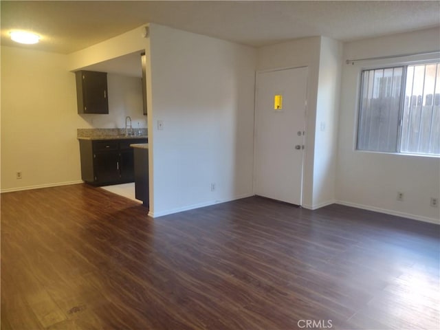 interior space with sink and dark hardwood / wood-style floors