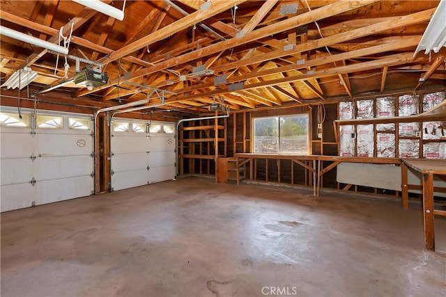 garage featuring a garage door opener