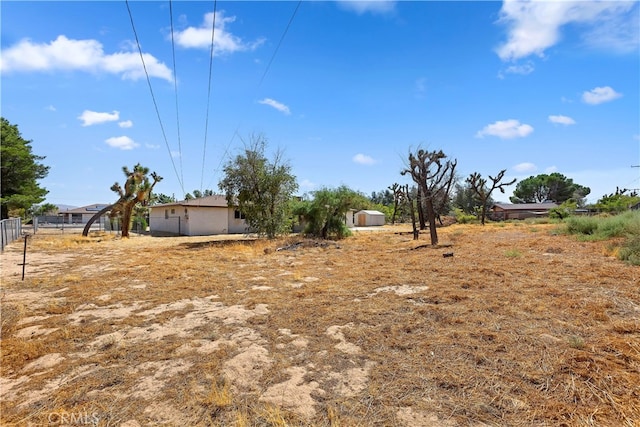 view of yard with a rural view