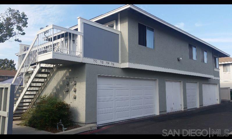 view of property exterior with a garage