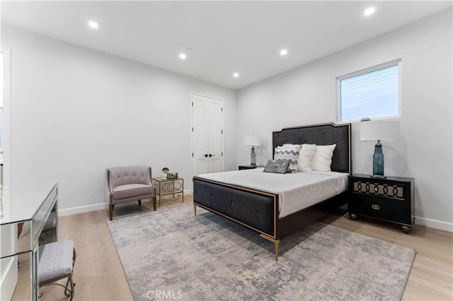 bedroom featuring light hardwood / wood-style floors