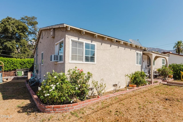 view of property exterior featuring cooling unit