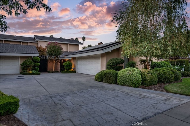 front facade with a garage