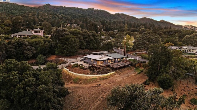 aerial view at dusk with a mountain view