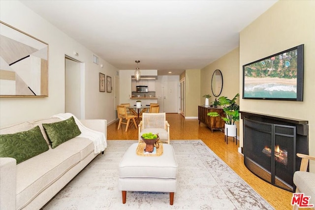 living room with wood-type flooring