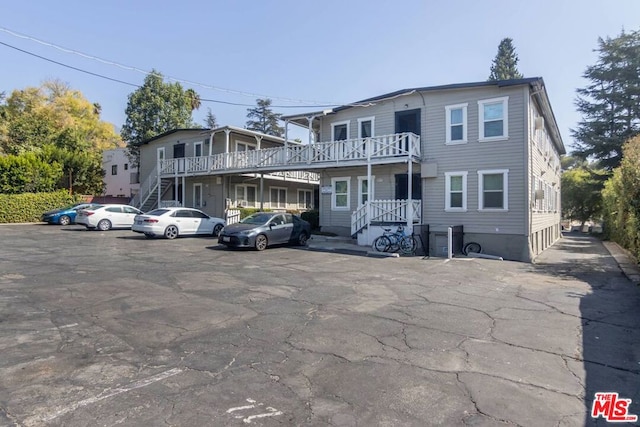 view of property with a balcony