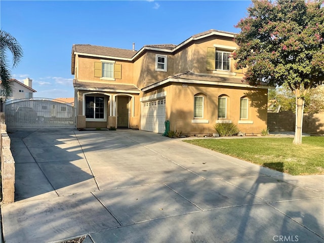 view of front facade with a garage and a front lawn