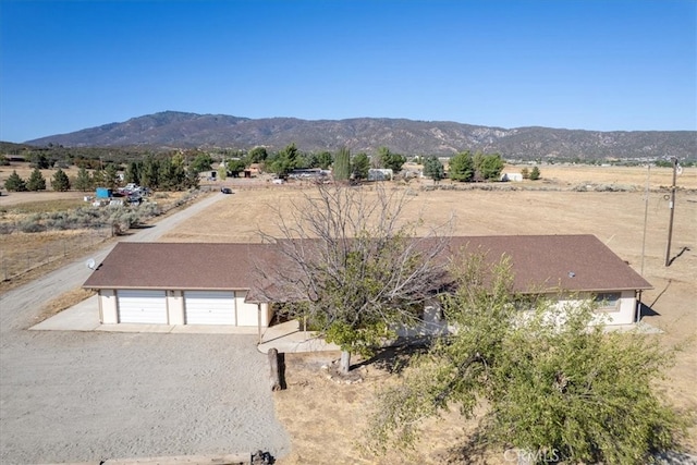 bird's eye view with a mountain view and a rural view