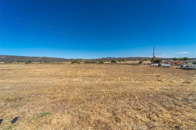 exterior space with a rural view