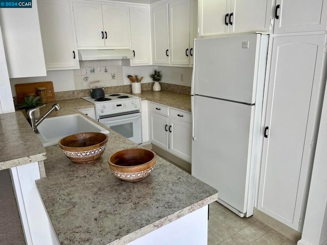 kitchen with backsplash, sink, white cabinetry, and white appliances