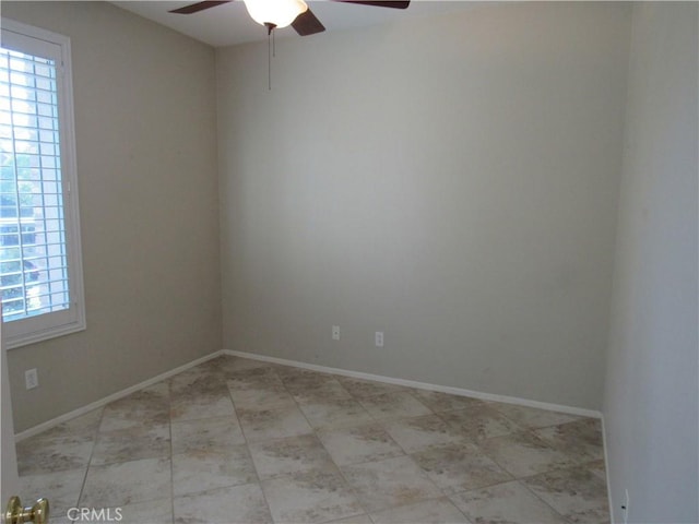 unfurnished room with ceiling fan