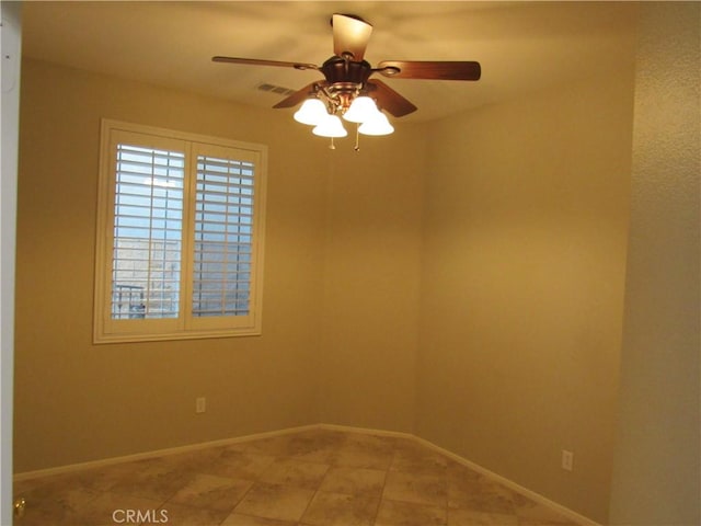 spare room featuring ceiling fan