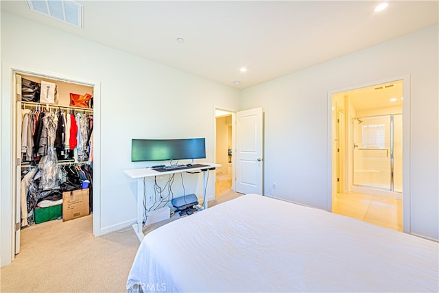 carpeted bedroom with a closet