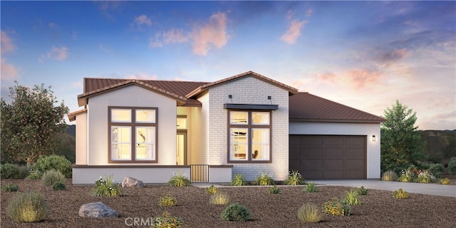 view of front of home featuring a garage