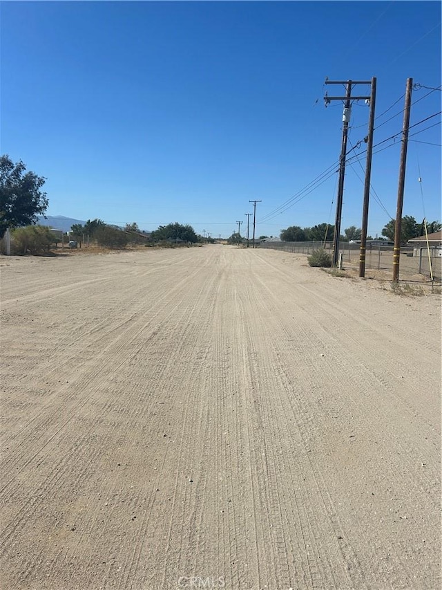 view of street featuring a rural view