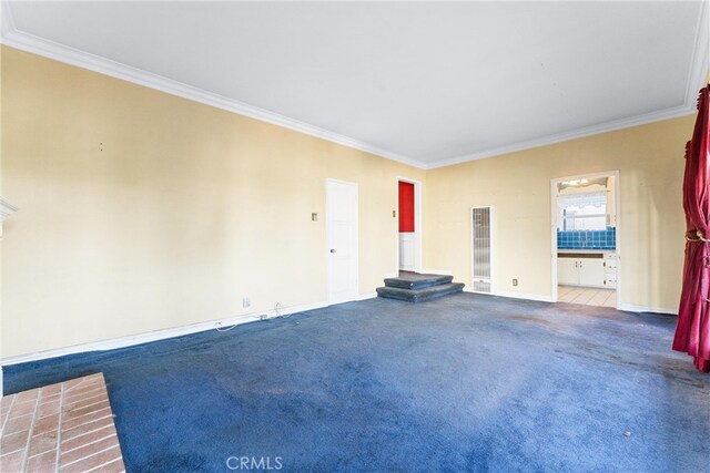 interior space with crown molding and carpet flooring