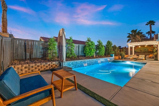 pool at dusk featuring outdoor lounge area, a pergola, pool water feature, and a patio area