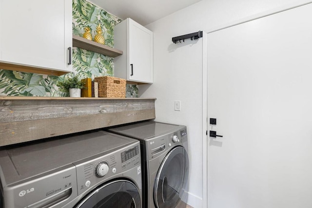 laundry room featuring cabinets and independent washer and dryer