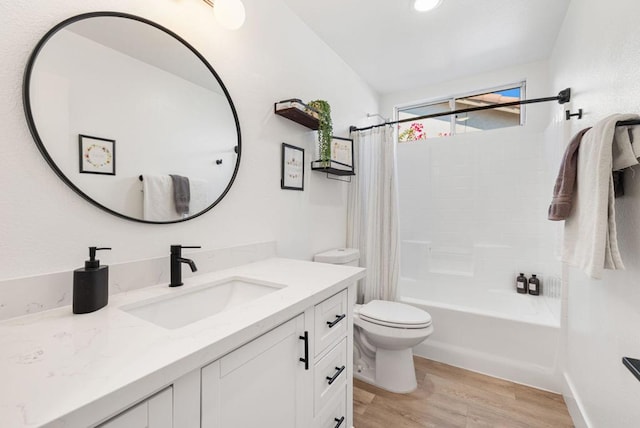 full bathroom with hardwood / wood-style floors, vanity, toilet, and shower / bath combo