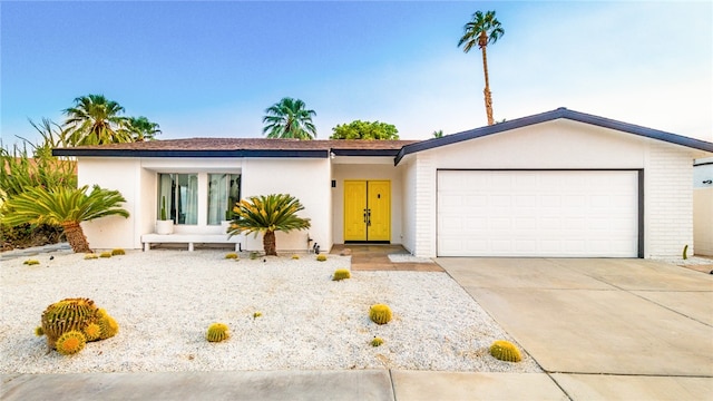 ranch-style home with a garage