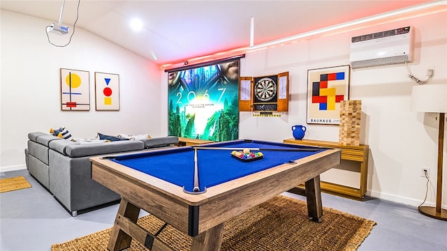 recreation room featuring an AC wall unit, lofted ceiling, pool table, and concrete floors