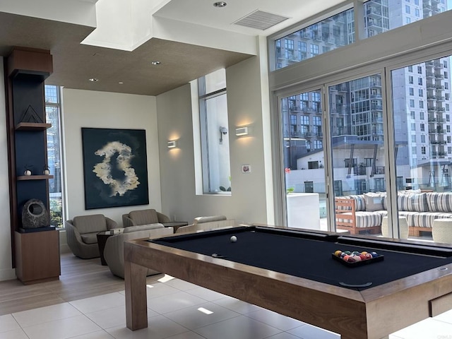 recreation room with pool table and light tile patterned floors