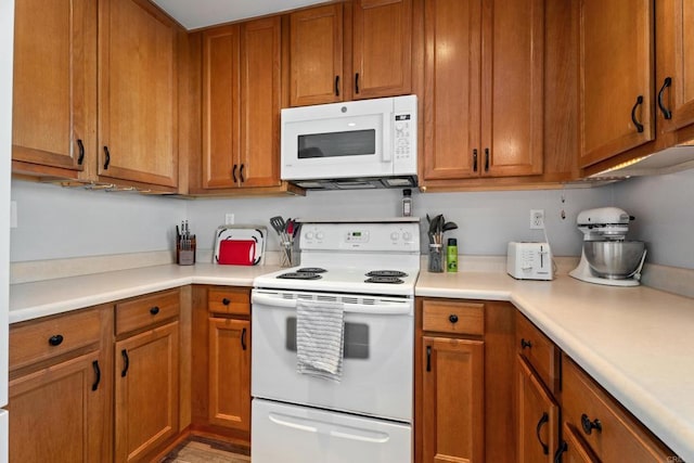 kitchen featuring white appliances