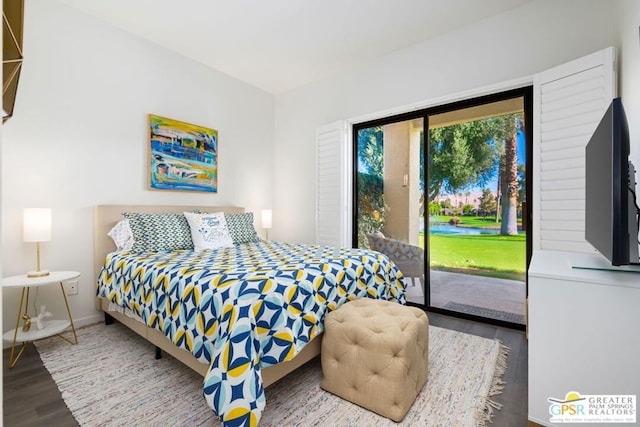 bedroom with access to exterior and wood-type flooring