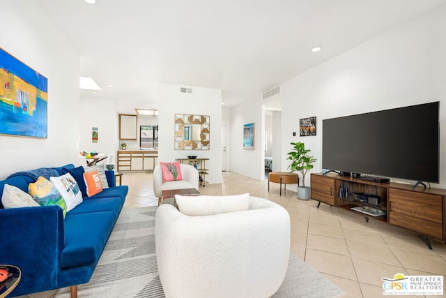 living room featuring light tile patterned floors