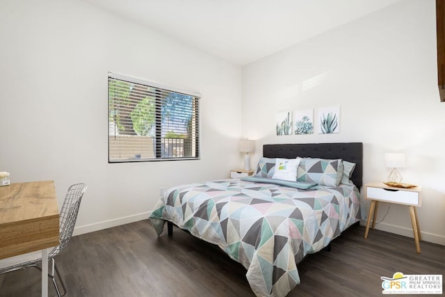 bedroom featuring dark hardwood / wood-style flooring