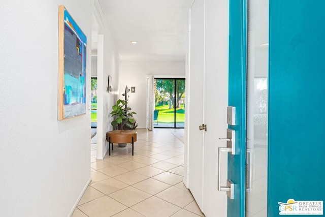 hallway with light tile patterned floors