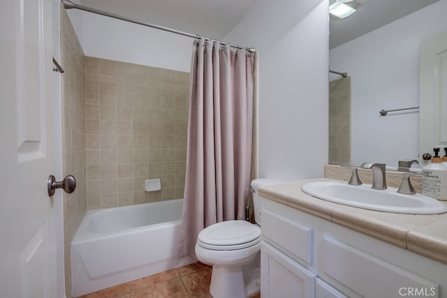 full bathroom with shower / bath combination with curtain, tile patterned floors, vanity, and toilet