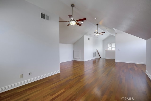 bonus room featuring lofted ceiling and dark hardwood / wood-style flooring